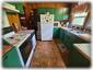 Fully-Equipped Kitchen Leading To Pantry & Bunk Bedroom